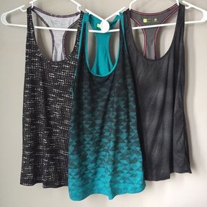 3 EUC Xersion workout tanks